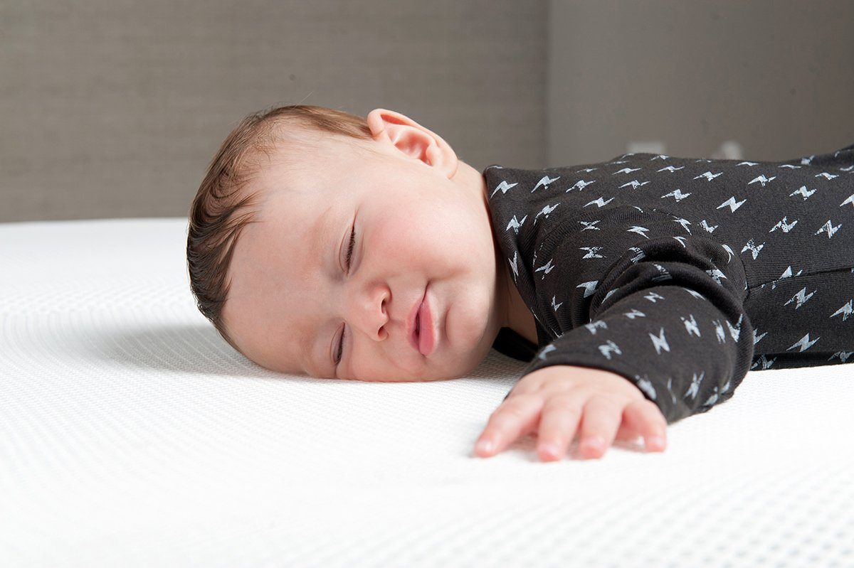 Baby sleeping on Numu mattress